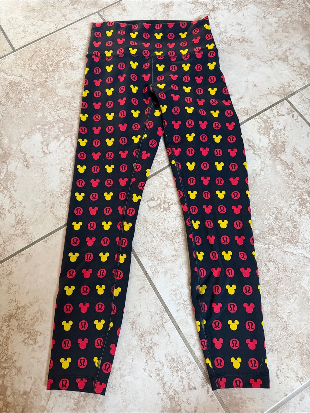 Disney x Lululemon red, yellow, and black Mickey head leggings size 6